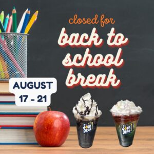 graphic with books stacked on a school desk next to an apple and two Soda Drop drinks.